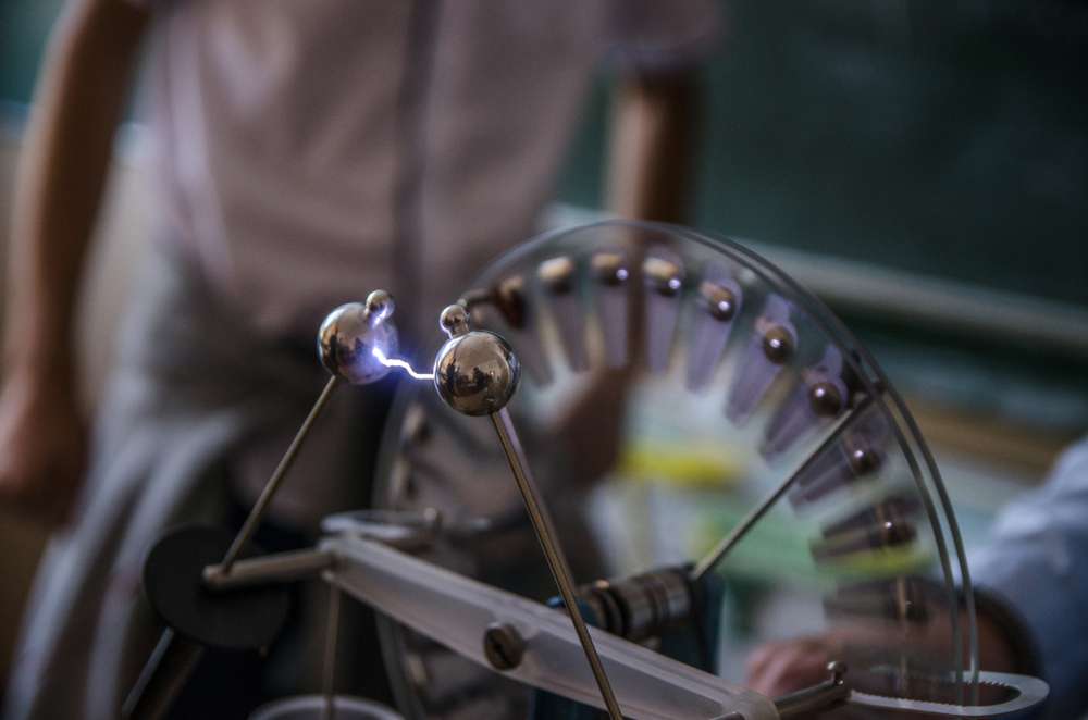 An electrostatic device generating a charge.